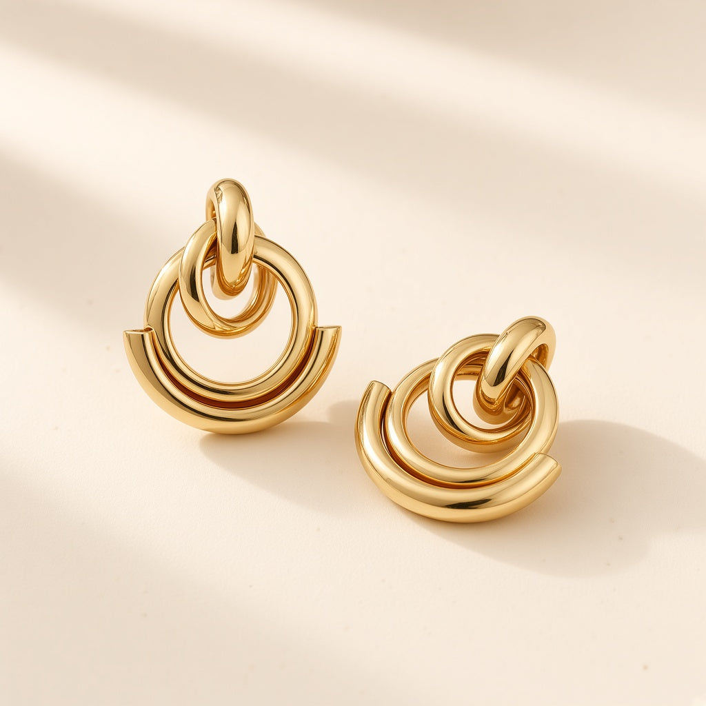 Geometric Interlocking Hoop Earrings – Gold / Silver Crescent Design